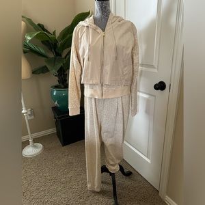 Fabletics warmup suit. Beige with leopard print.